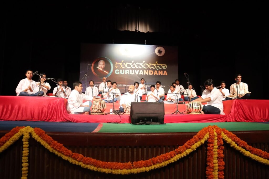 Student ensemble performing at the Guruvandana festival